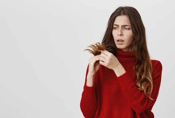 why does my hair feel like straw