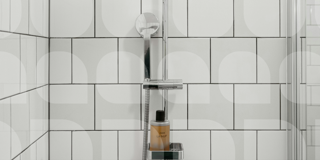 white tiled clean shower