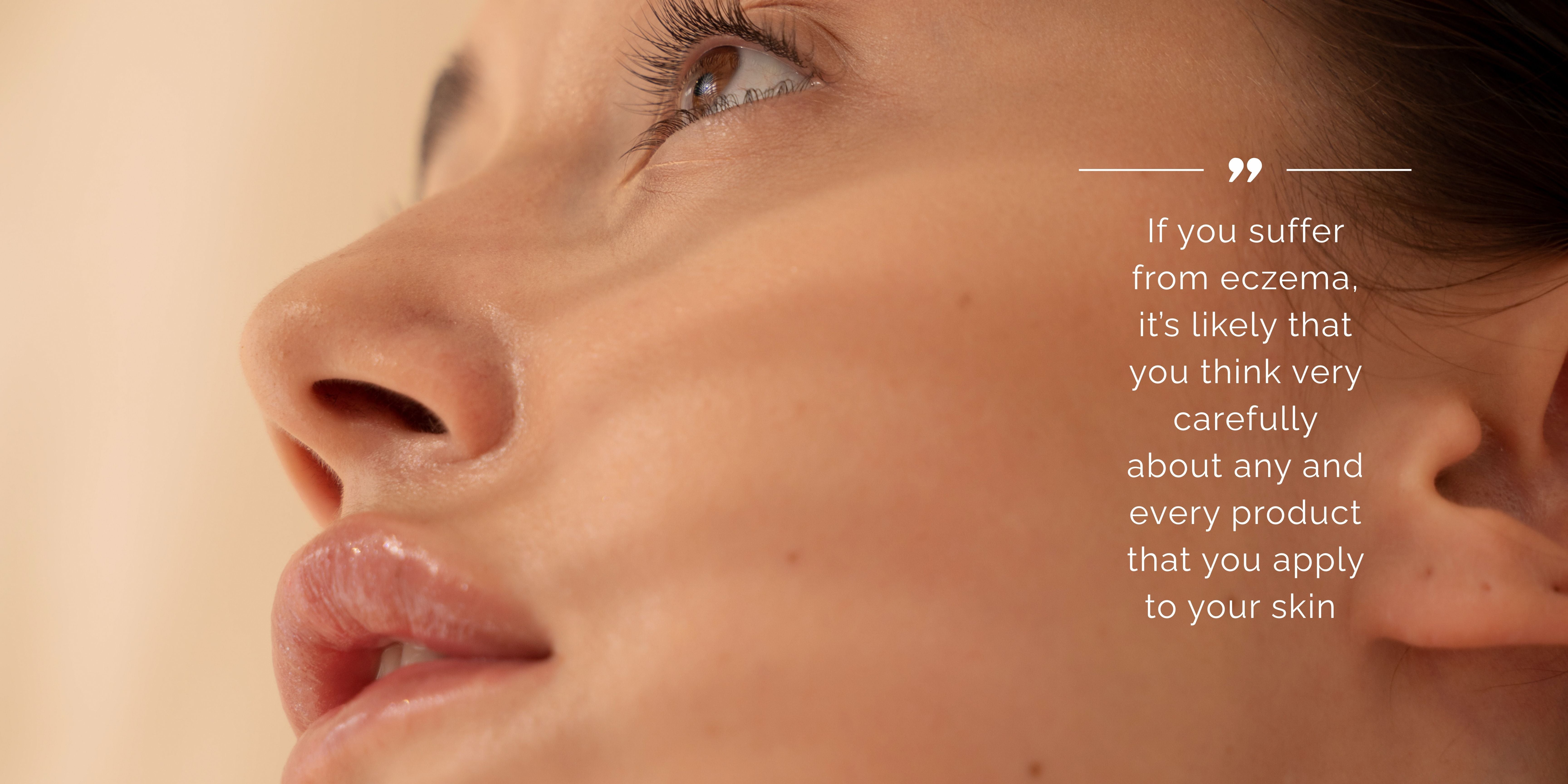 Side profile of woman's face looking up to the light 