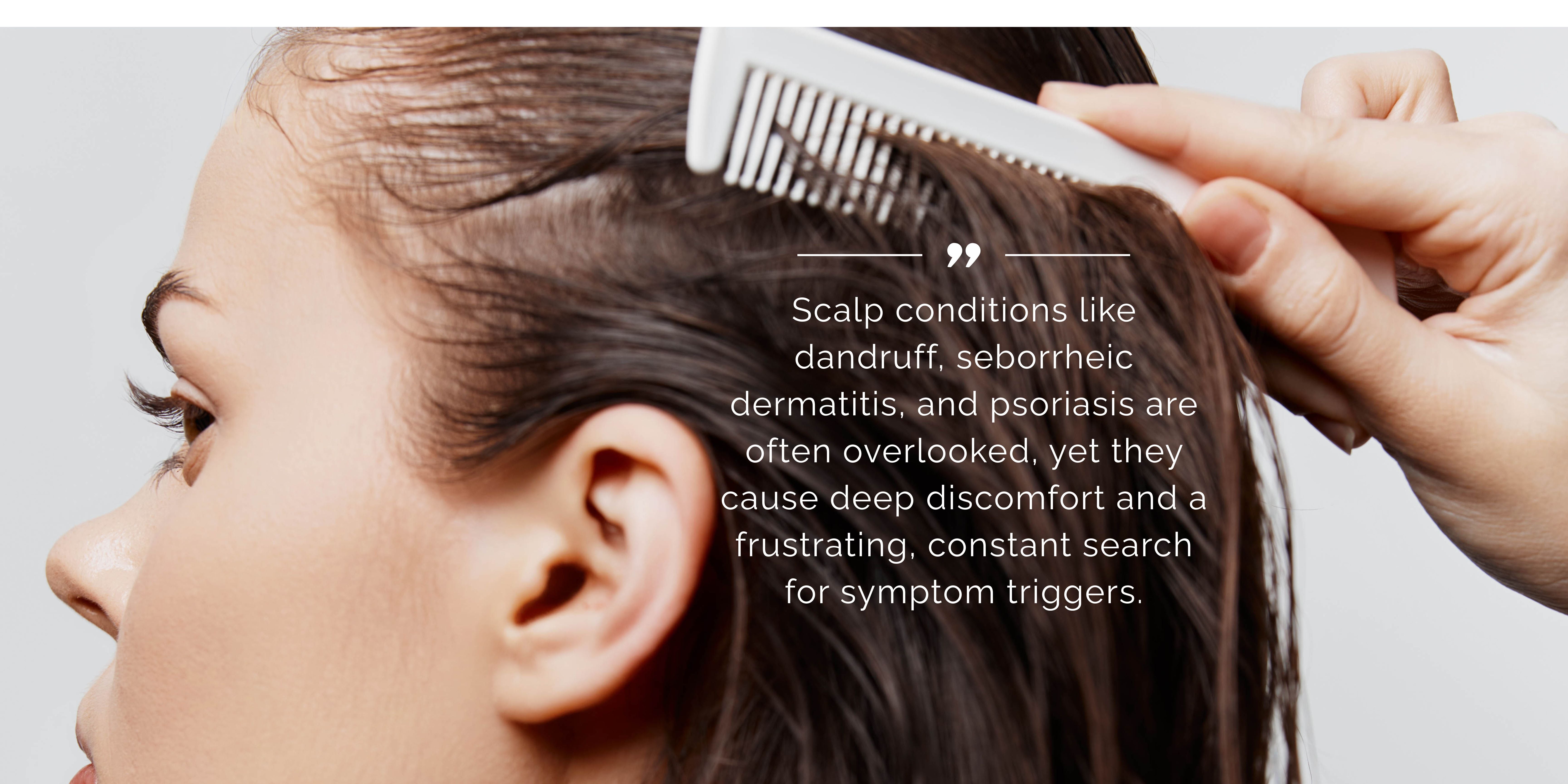 Close up of woman brushing her wet hair with a comb 