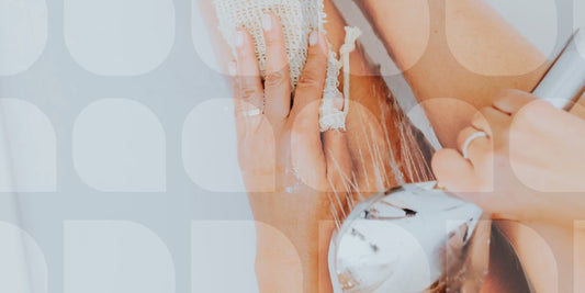 close up of woman showering her legs