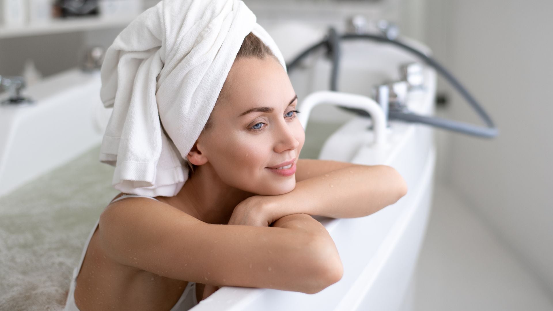A girl relaxing in her bathtub