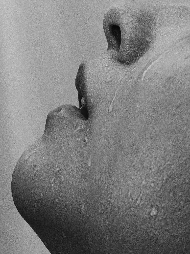 Close-up of a person's face with a blurred background
