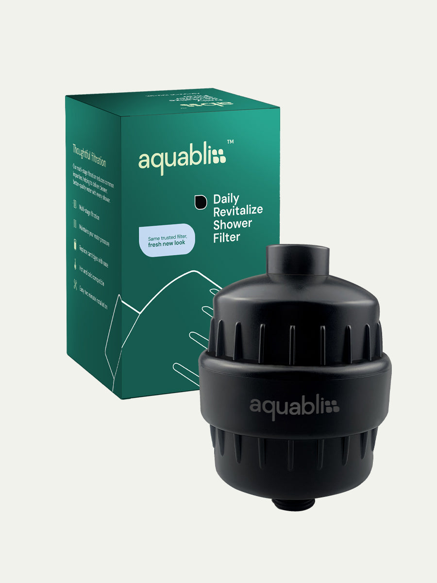 Aquabliss shower filter with packaging on a white background and product in the foreground
