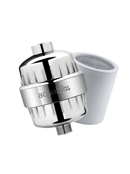 A polished chrome shower filter cartridge with the white filter basket removed and set beside it, on a solid white background. The Aquabliss brand logo is visible on the metal body.