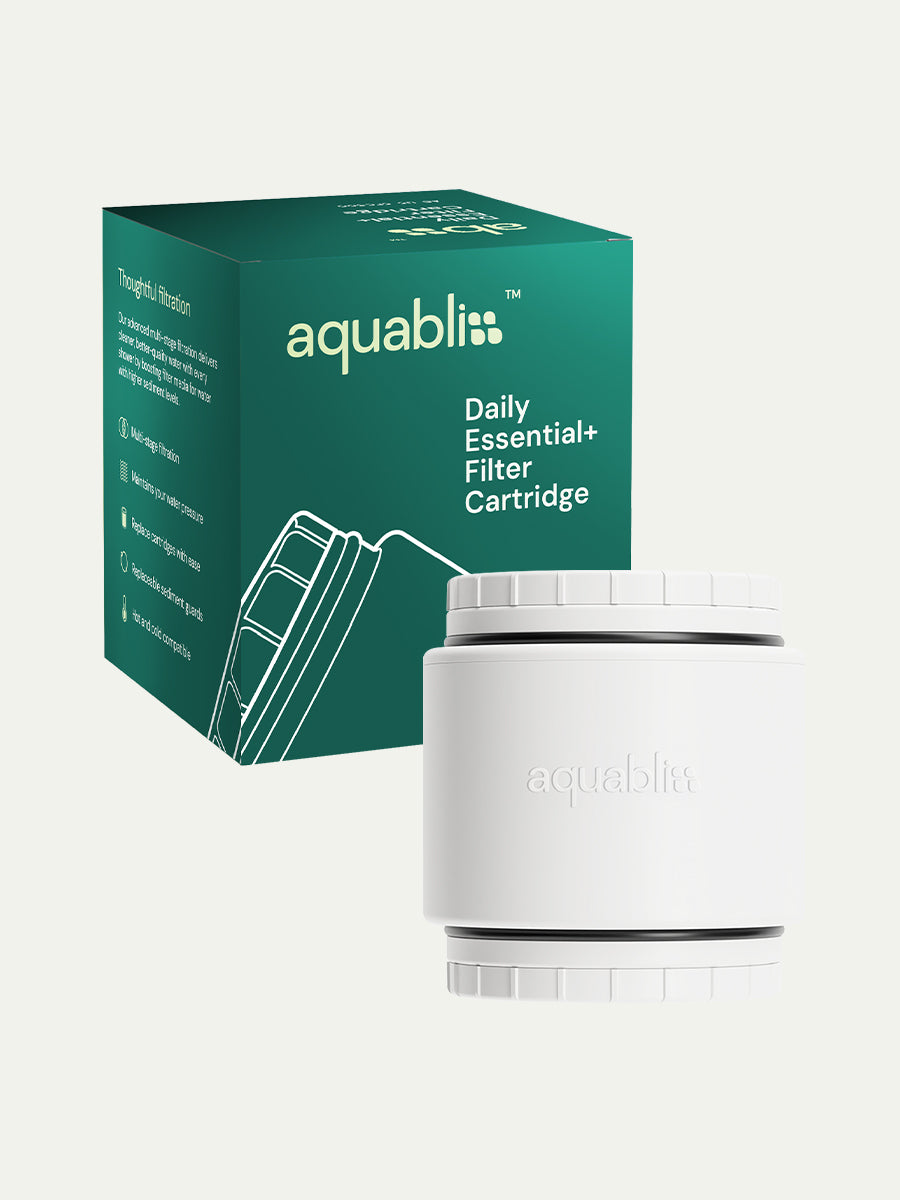 Box of Aquabliss daily essential+ shower filter cartridge on a white background with  the product in the foreground
