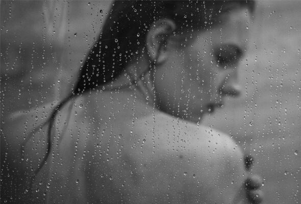 woman enjoying shower with top rated shower filter