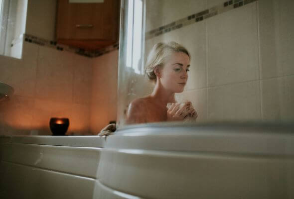 young girl taking shower